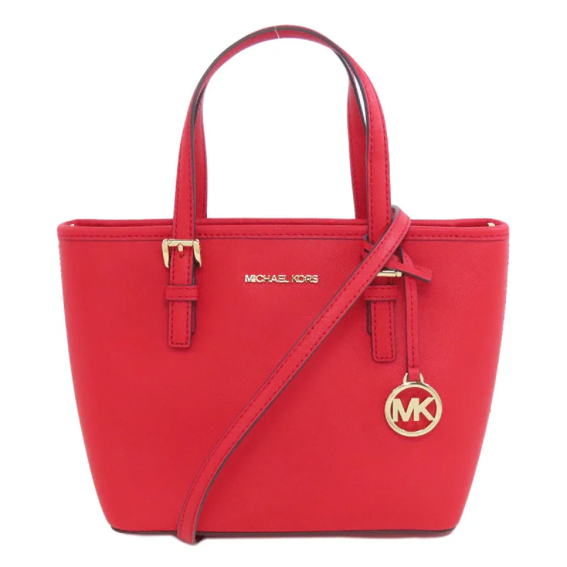 Handle bags with sturdy bases for stability -Michael Kors  Pvc Tote Bag (Pre-Owned)