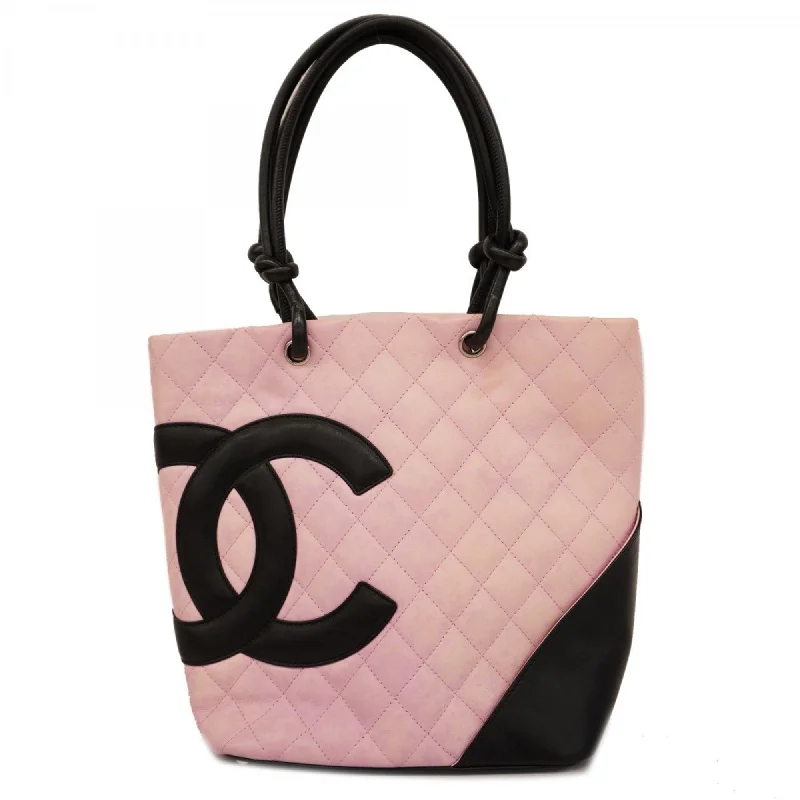 Handle bags with drawstring accents for style -Chanel  pink Leather Tote Bag (Pre-Owned)