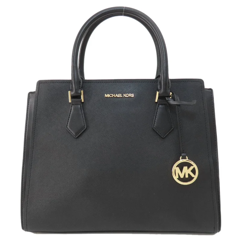 Handle bags with subtle embroidery for detail -Michael Kors  Pvc Tote Bag (Pre-Owned)