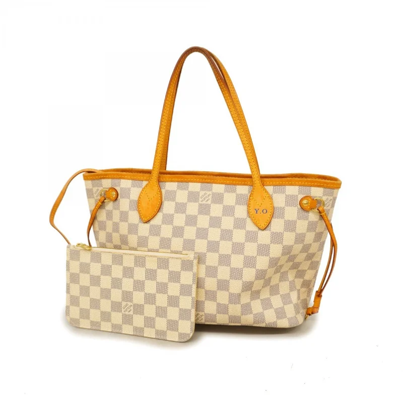 Handle bags with hidden pockets for security -Louis Vuitton  Tote Bag (Pre-Owned)