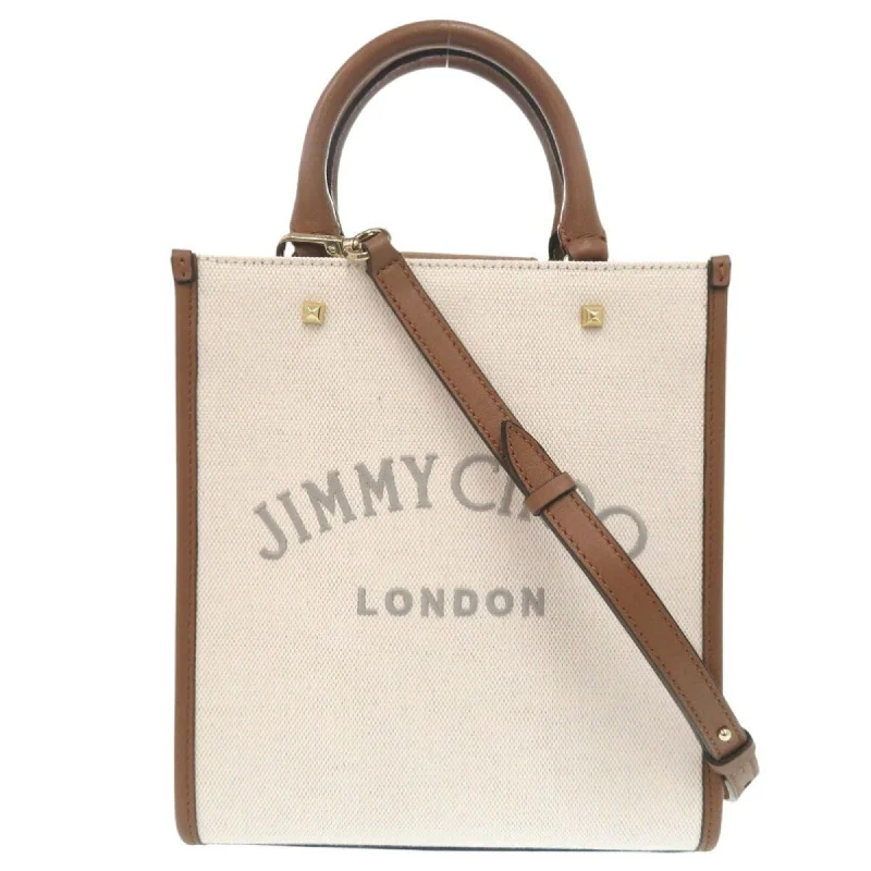 Reversible handle bags offering dual design styles -Jimmy Choo   Canvas Leather Handbag Tote Bag (Pre-Owned)