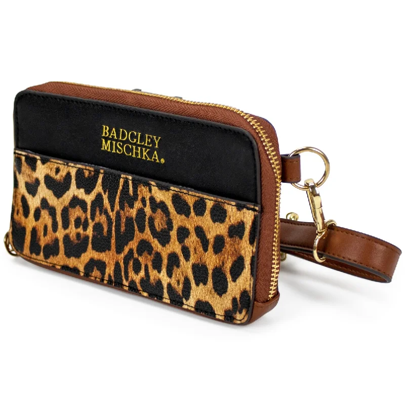 Handle bags with bohemian tassel embellishments -BADGLEY MISCHKA Leopard Vegan Leather Pouch Belt Bag