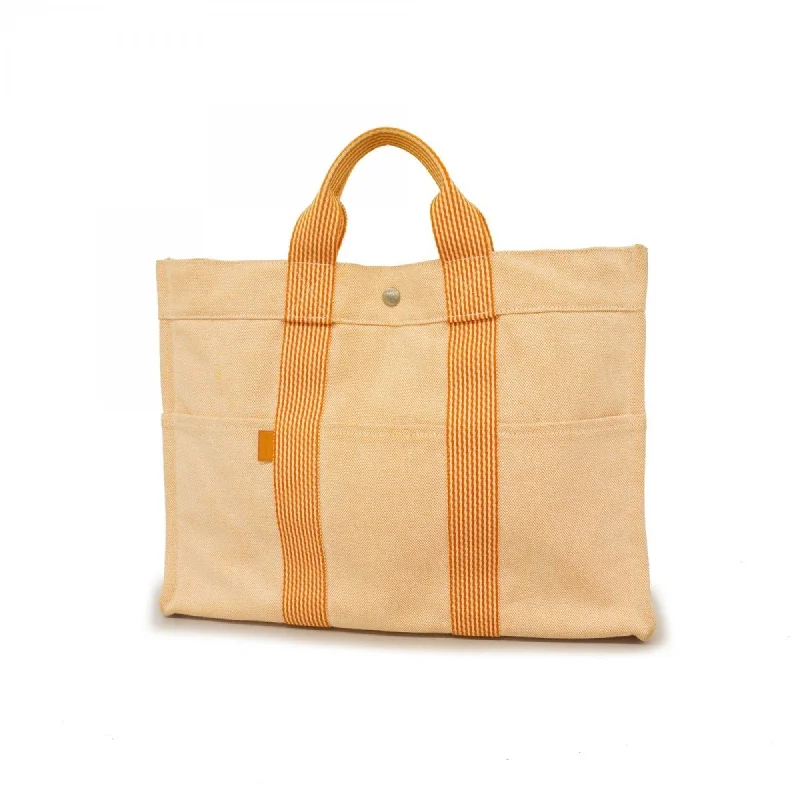 Handle bags with pastel colors for softness -Hermes  Canvas Tote Bag (Pre-Owned)