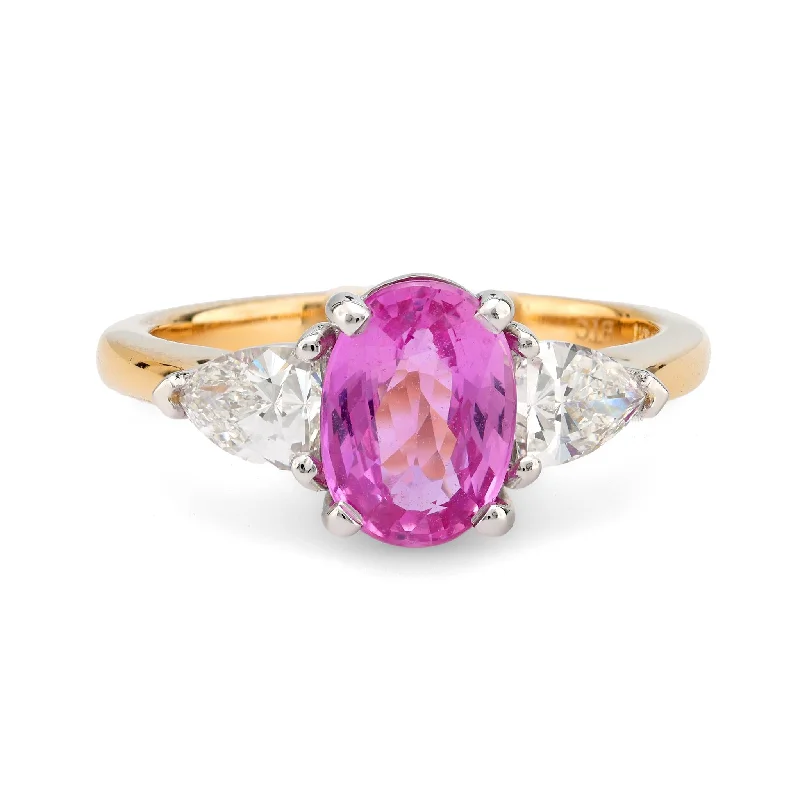 Women’s rings with peacock ore for iridescence -GIA 2 carat pink sapphire diamond 18k yellow gold three stone ring