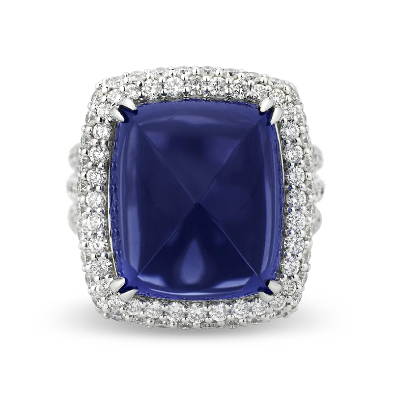 Women’s rings with hematite for metallic shine -Sugarloaf-cut Tanzanite Ring, 22.10 Carats