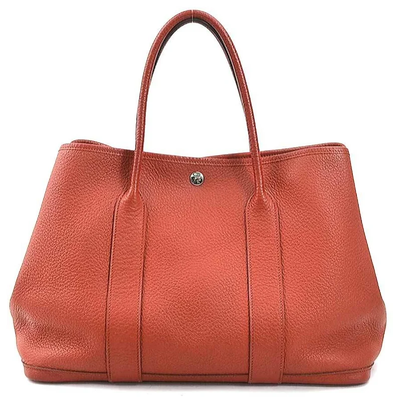 Handle bags with sturdy canvas for longevity -Hermes  Country Leather Handbag Tote Bag (Pre-Owned)