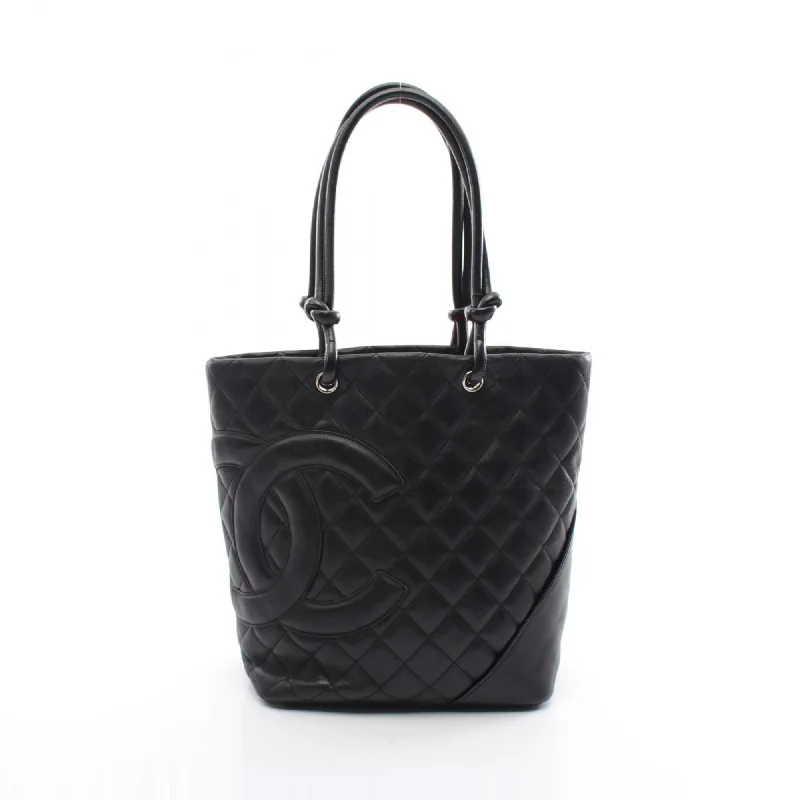 Handle bags with bohemian tassel embellishments -Chanel  Leather Tote Bag (Pre-Owned)