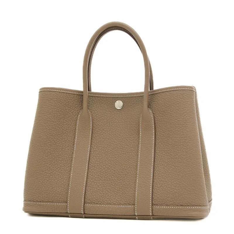 Handle bags with minimalist sleek silhouettes -Hermes Garden Etoupe   Negonda Leather Handbag Tote Bag (Pre-Owned)