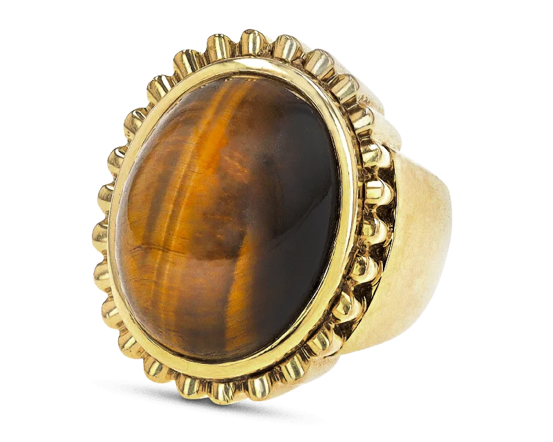 Women’s rings with channel-set peridot gems -David Webb Tiger's Eye Dome Ring