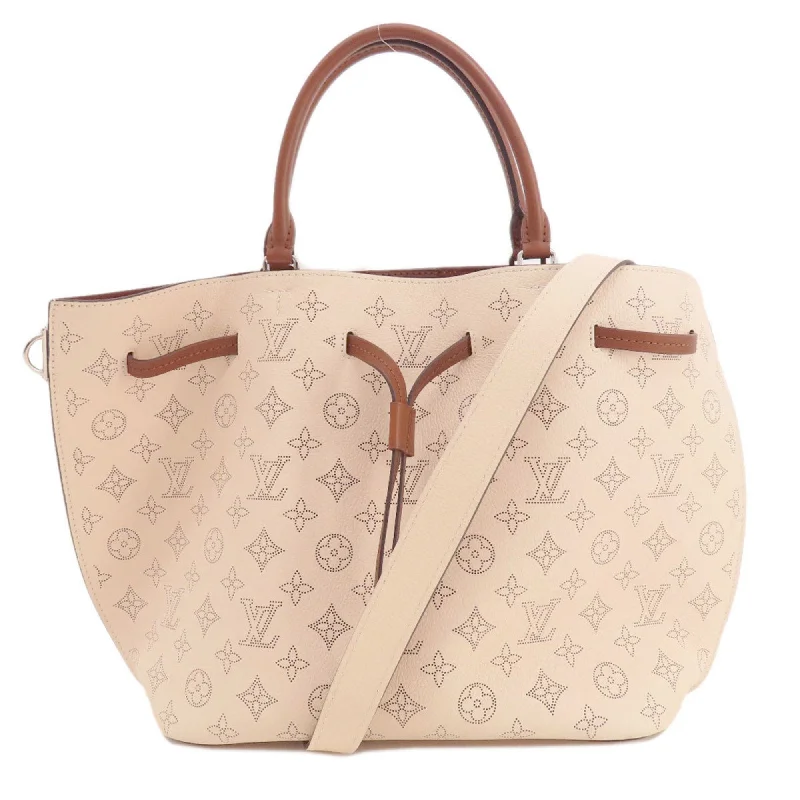 Handle bags with woven fabric for texture -Louis Vuitton Mahina Leather Tote Bag (Pre-Owned)