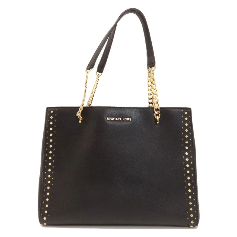 Handle bags with expandable sides for flexibility -Michael Kors  Leather Tote Bag (Pre-Owned)