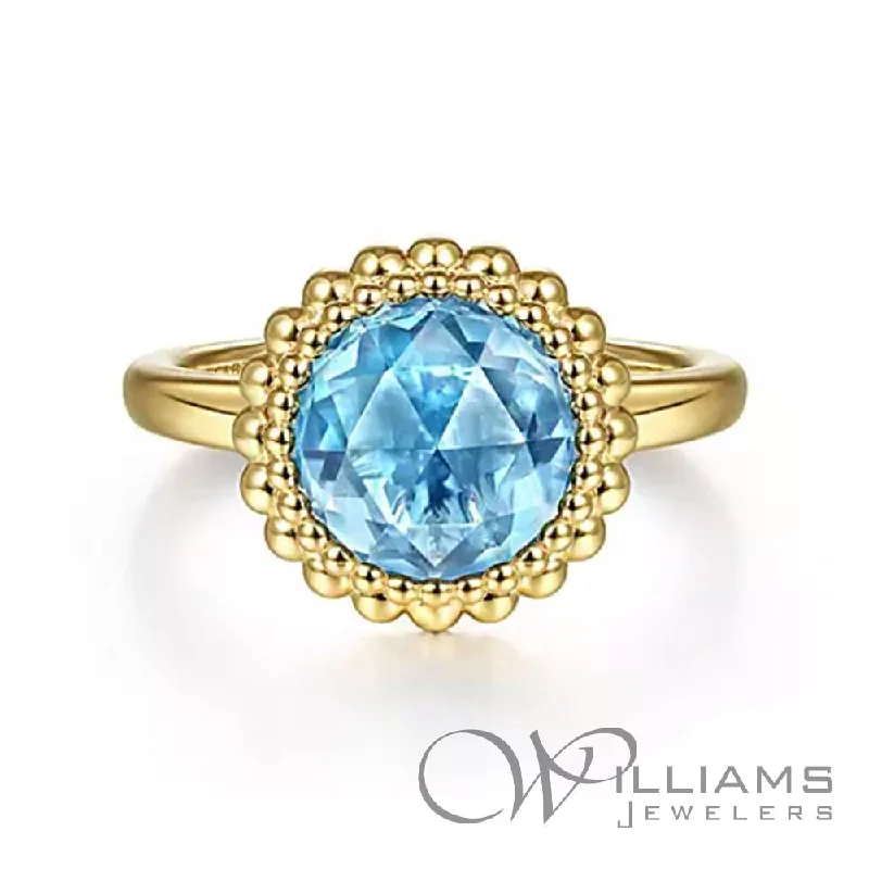 Women’s rings with hematite for metallic shine -Gabriel & Co. Bujukan 14 Karat Blue Topaz Ring