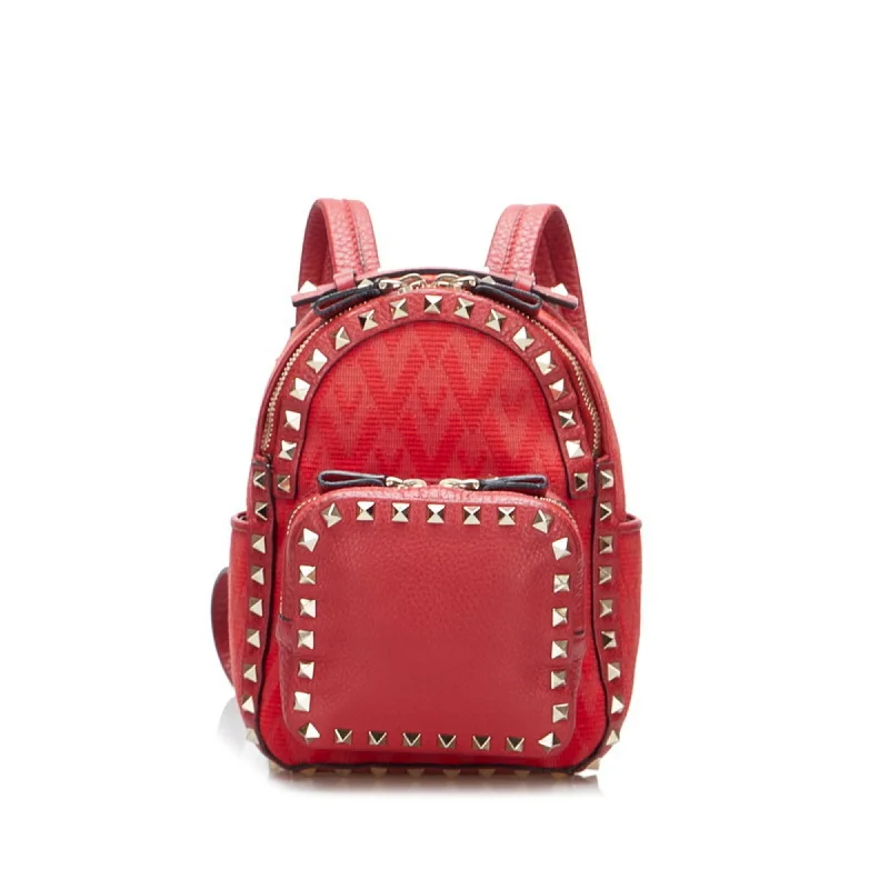 Handle bags with compact designs for portability -Valentino  Canvas Leather Backpack (Pre-Owned)