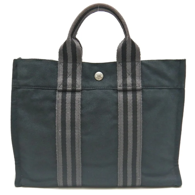 Handle bags with sleek hardware for sophistication -Hermes   Cotton Canvas Tote Bag (Pre-Owned)