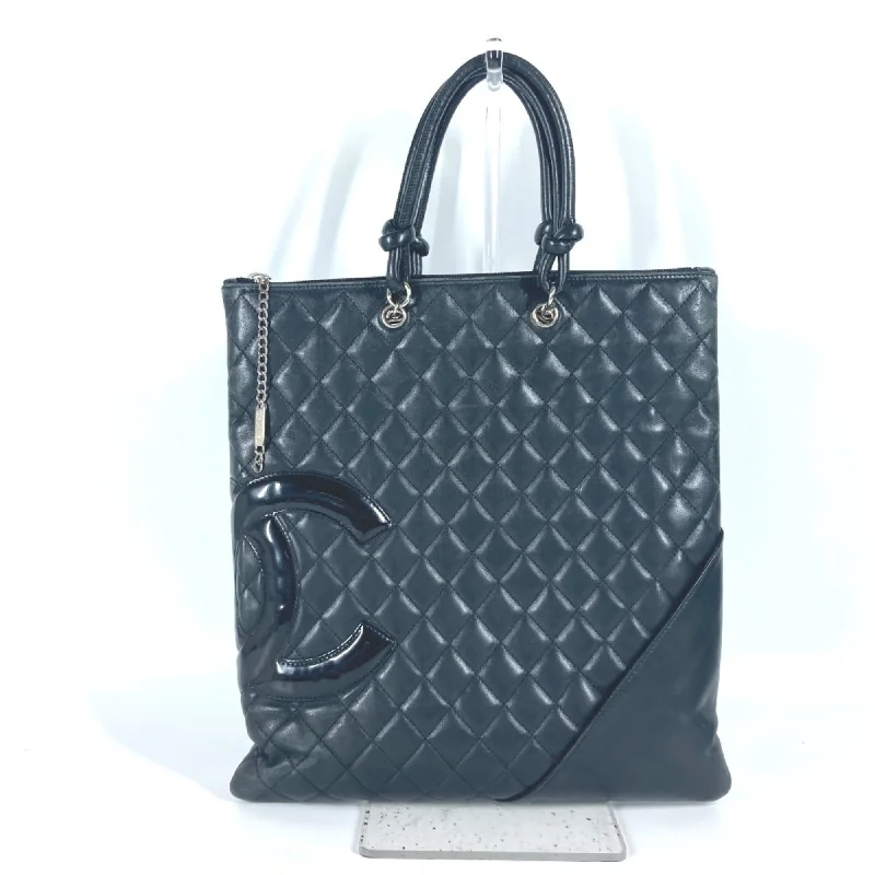 Handle bags with modern cutouts for style -Chanel   Leather Handbag Shoulder Bag Tote Bag (Pre-Owned)