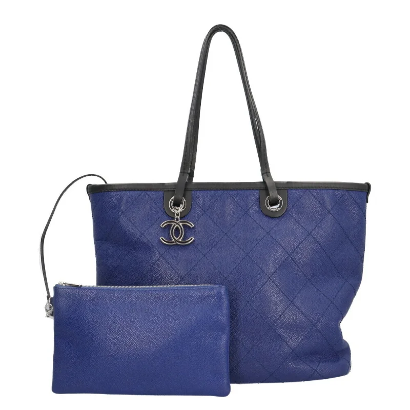 Handle bags with hidden pockets for security -Chanel  blue Caviar Leather Tote Bag (Pre-Owned)