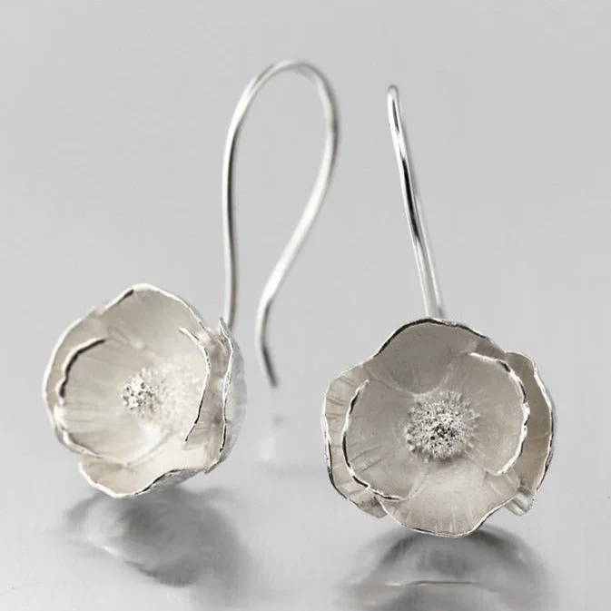 Hoop earrings with a chunky design for a bold and trendy statement-Poppy Sterling Silver Loop Earrings