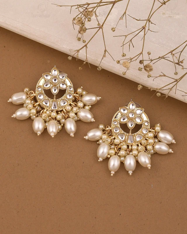 Hoop earrings with twisted metal designs for a dynamic and modern style-Tara Kundan Studs-M