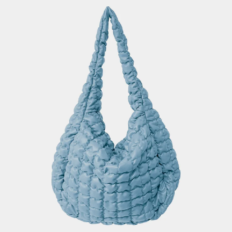 Best necklaces and pendants with statement designs for a fashionable accessory-Oversized Quilted Vegan Puffer Tote Blue